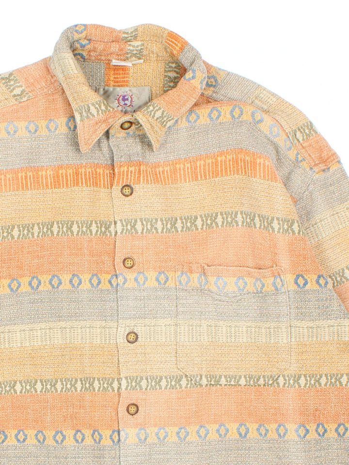 Vintage 90's The Territory Ahead Shirt in a multicoloured patterned colourway, button up and has a chest pocket.