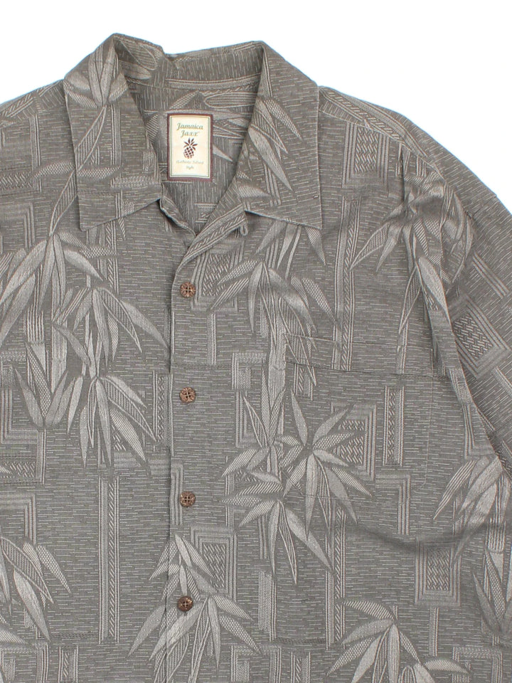 Vintage Hawaiian Shirt in a grey colourway with palm tree pattern all over, button up and has a chest pocket.