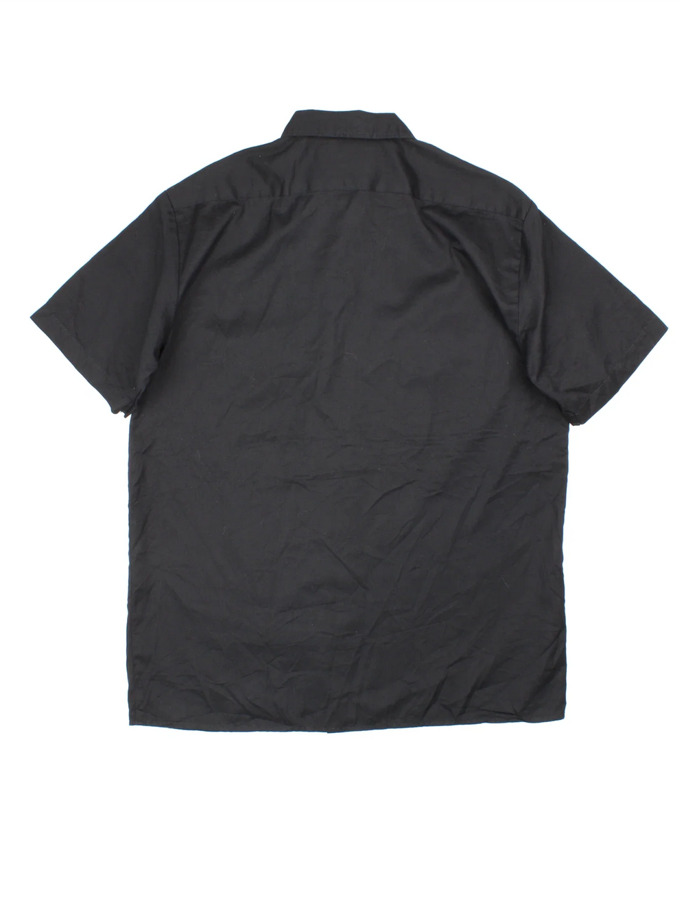 Dickies Work Shirt in a black colourway, button up with double chest pockets and the logo embroidered by the hem.
