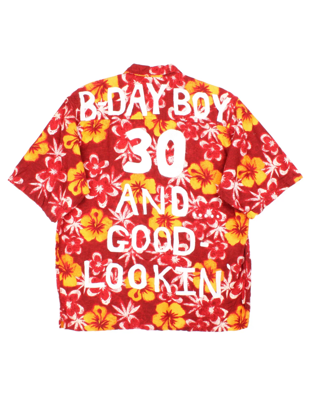 O'neill Hawaiian B-Day Boy Shirt in a red/yellow colourway with all over flower print. Button up, front chest pocket and flocked B-Day Boy detailing on the back.