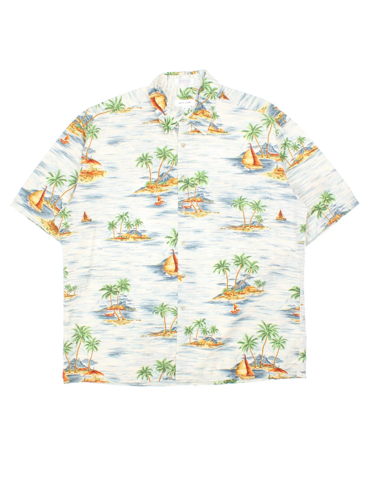 Vintage Pierre Cardin Shirt in a white/blue colourway with all over Hawaiian print. Button up and front chest pocket.