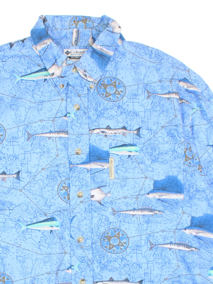 Columbia Fish Print Shirt in a blue colourway. Button up with front branded pocket detail.
