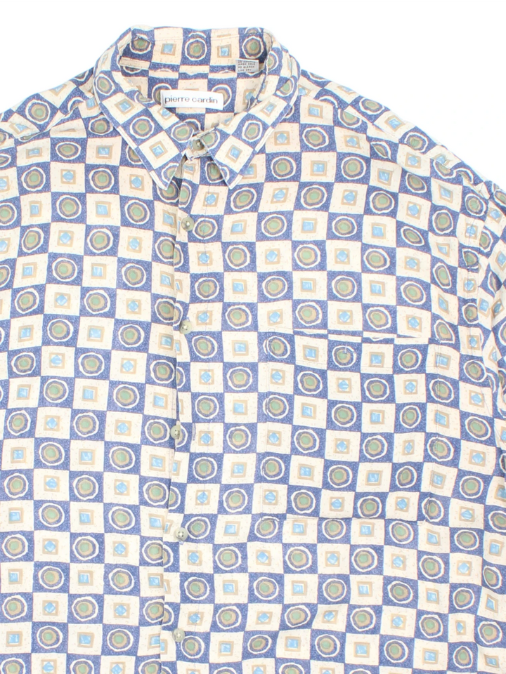 Vintage Pierre Cardin Shirt in a blue colourway with all over print. Button up with front pocket detail.