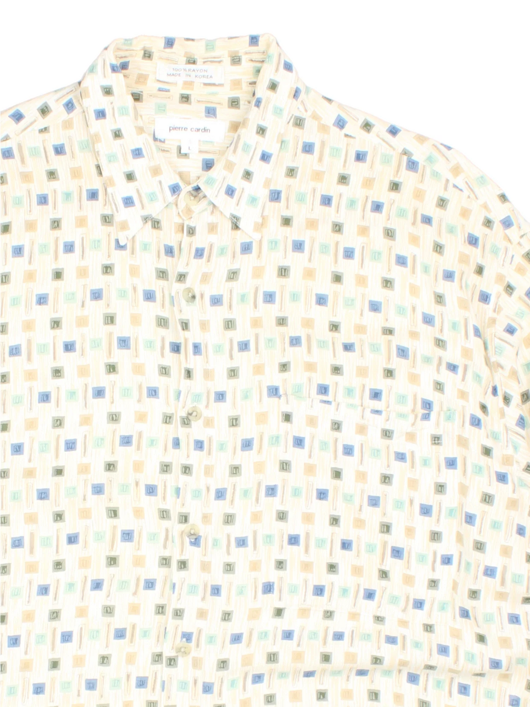 Vintage Pierre Cardin Shirt in a white colourway with all over pattern print. Button up with front pocket detail.