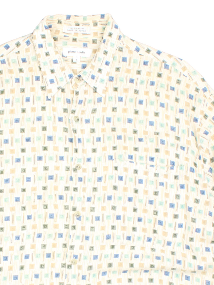 Vintage Pierre Cardin Shirt in a white colourway with all over pattern print. Button up with front pocket detail.
