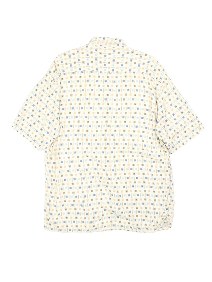 Vintage Pierre Cardin Shirt in a white colourway with all over pattern print. Button up with front pocket detail.
