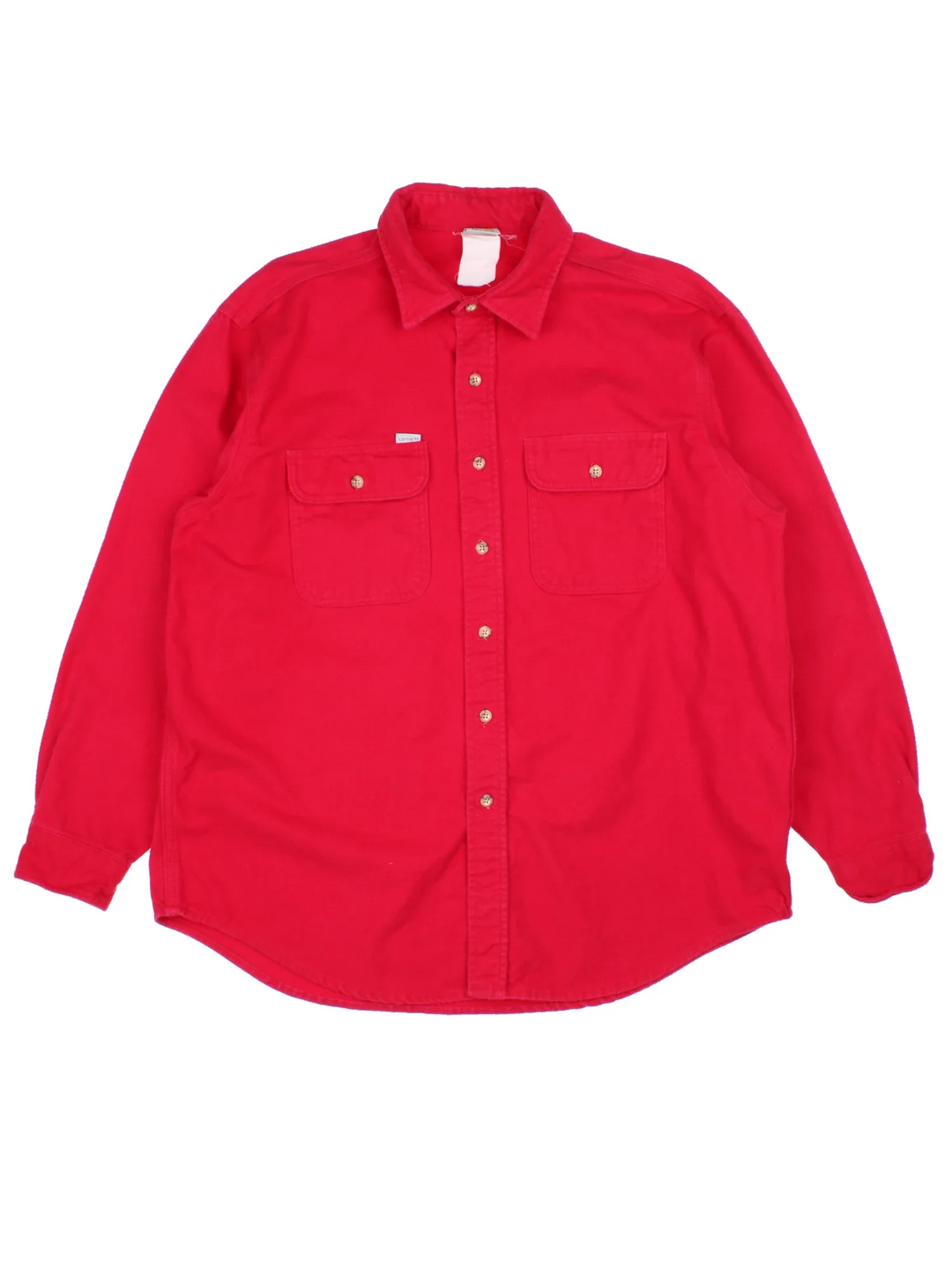Vintage Carhartt Heavy Cotton Shirt in a red colourway, button up and has double chest pockets with the logo tab embroidered on the front.