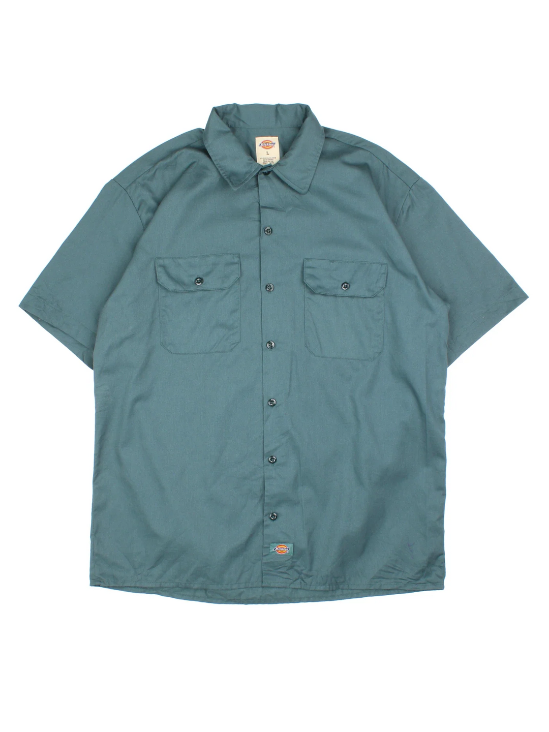 Dickies Work Shirt in a blue colourway, button up and has double chest pockets and the logo embroidered on the front by the hem.