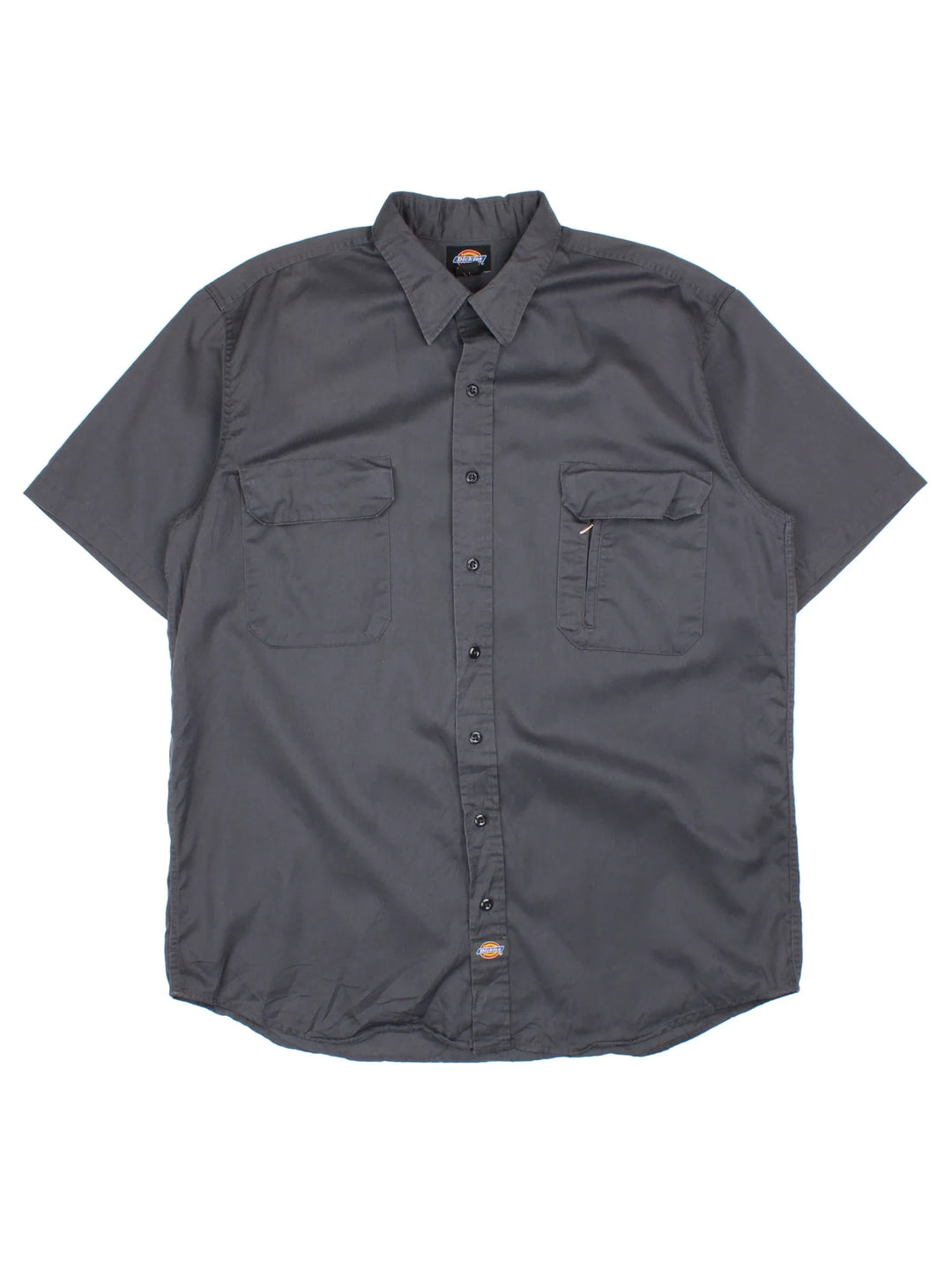 Dickies Work Shirt in a black colourway, button up and has double chest pockets and the logo embroidered on the front by the hem.