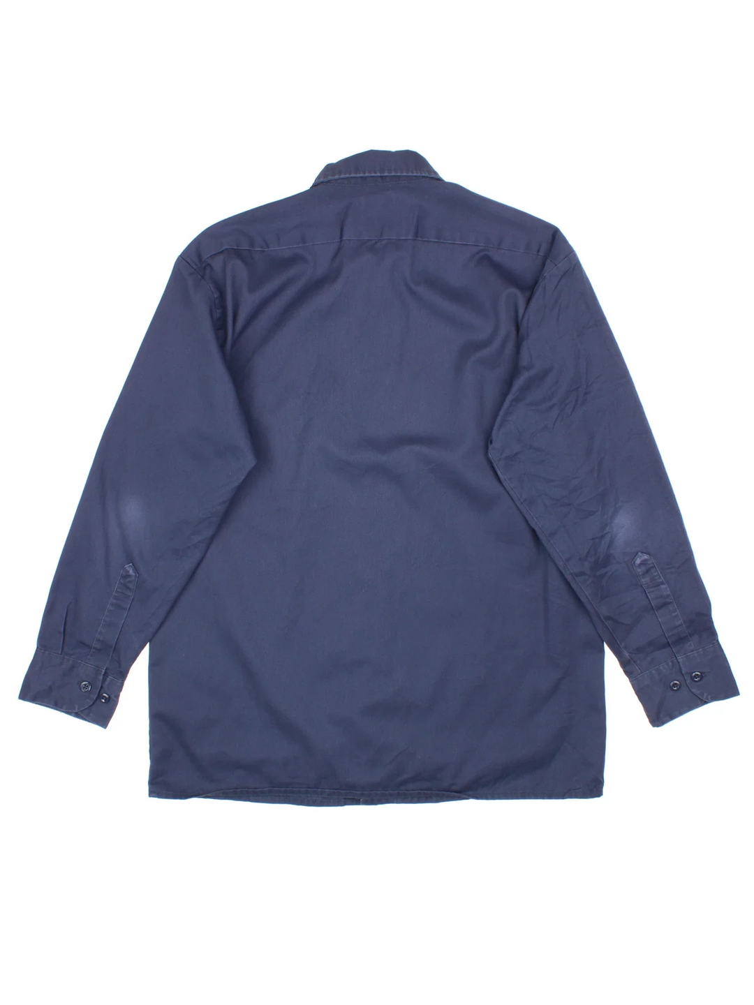Dickies Work Shirt in a blue colourway, button up and has double chest pockets and the logo embroidered on the front by the hem.