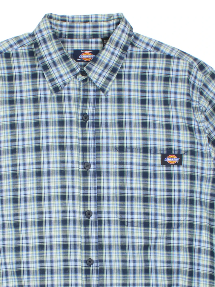 Dickies Shirt in a blue and green plaid pattern colourway, button up and has a chest pocket with the logo embroidered on the front.