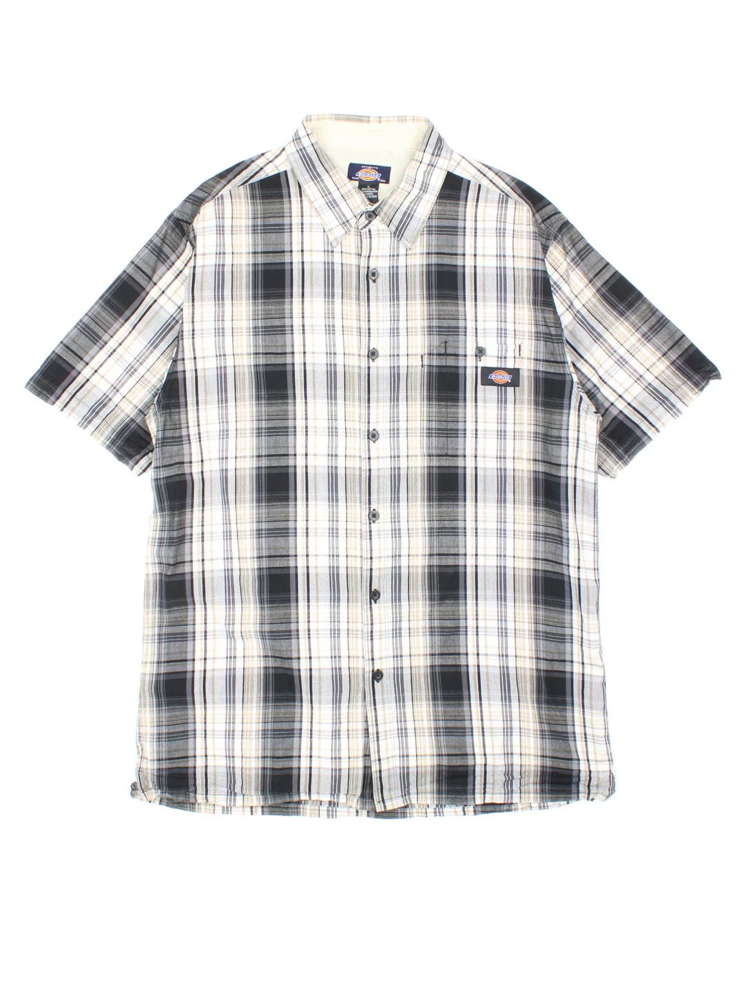 Dickies Shirt in a grey, white and black plaid pattern colourway, button up and has a chest pocket with the logo embroidered on the front.