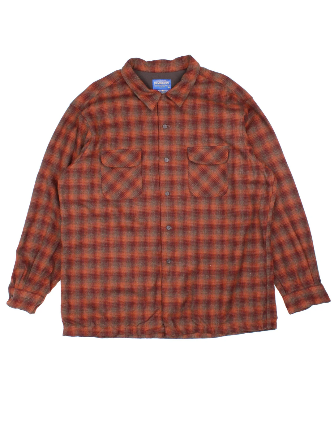 Pendleton Woollen Flannel Shirt in a red colourway with all over plaid pattern, button up and has double chest pockets.