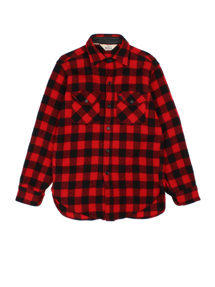 Woolrich Flannel Shirt in a red/black colourway. All over checked pattern, button up with x2 front pockets.