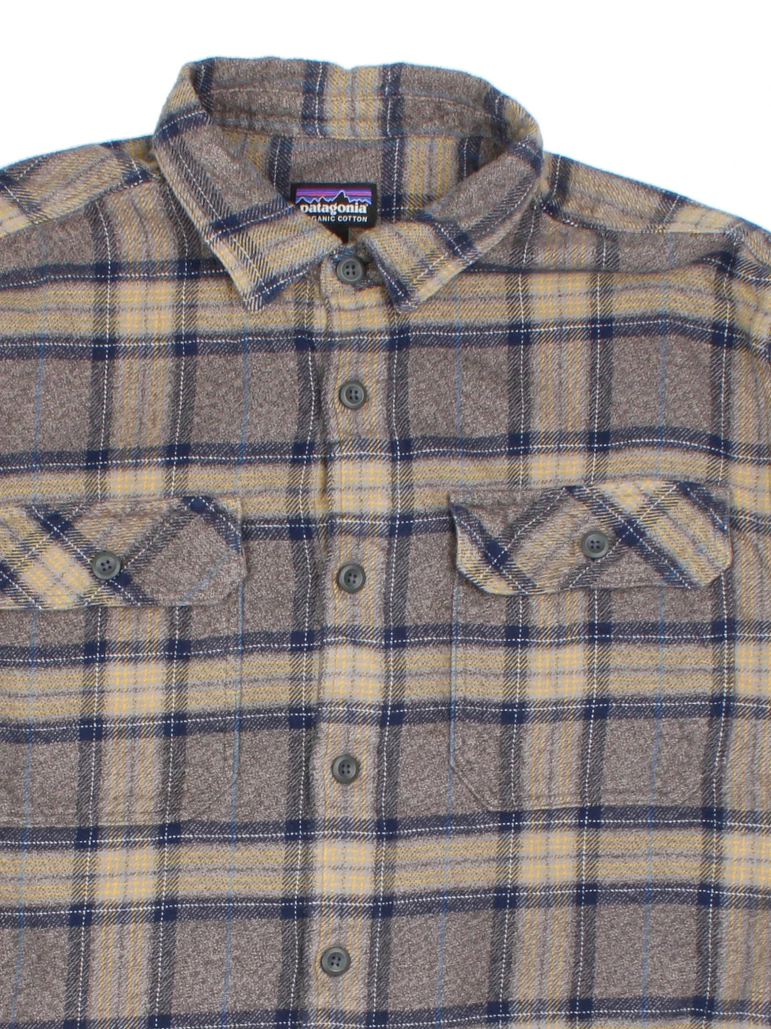 Patagonia Flannel Shirt in a brown colourway. All over checked pattern, button up with x2 front pockets and side tab branding.