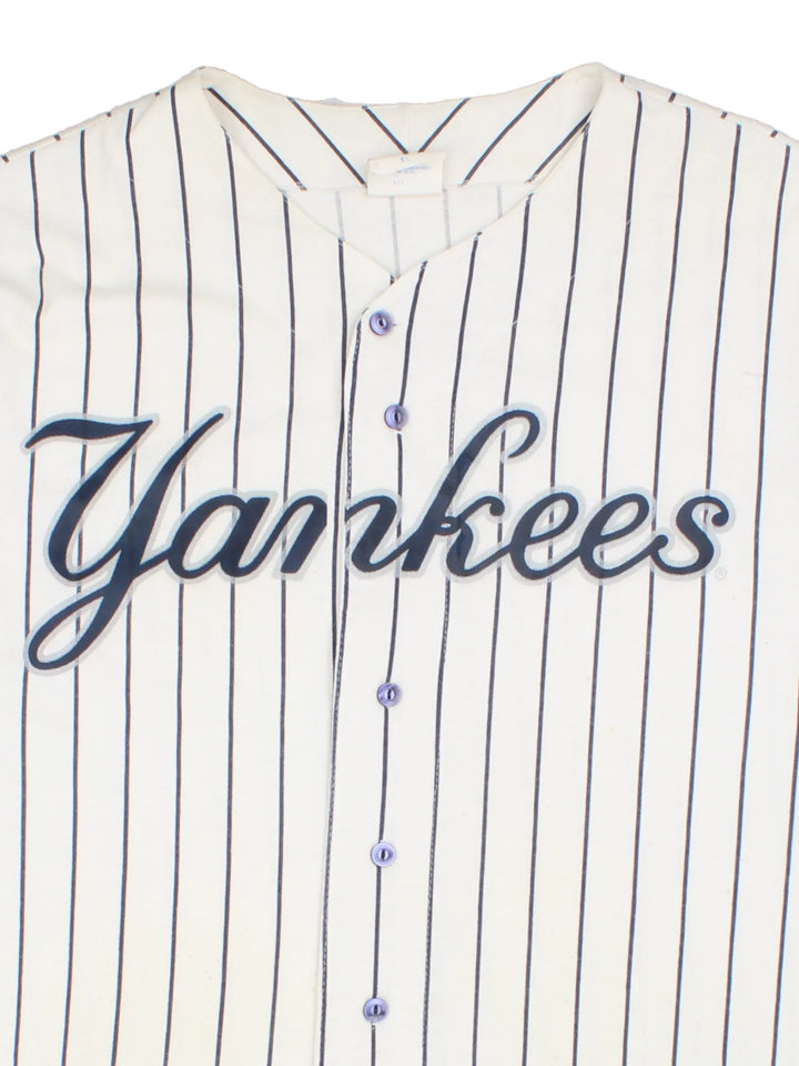 Vintage Majestic New York Yankees MLB Baseball Shirt in a white colourway with blue stripes. Button up with branding on front and sleeve.