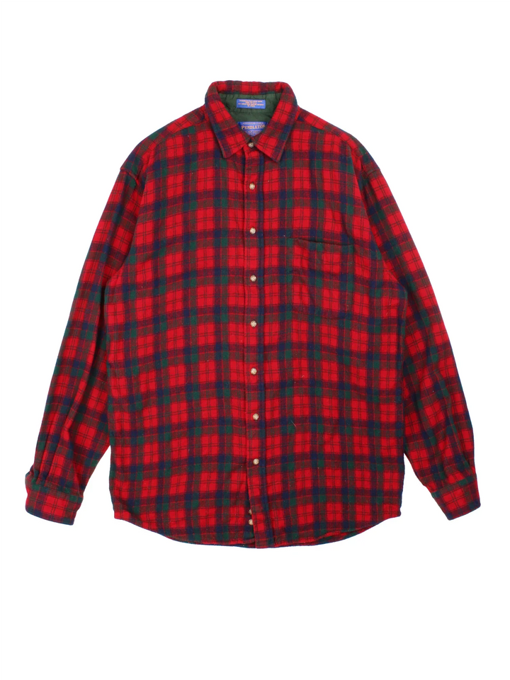 Pendleton Flannel Shirt in a red and black colourway with all over plaid pattern. button up with classic pocket on the front.