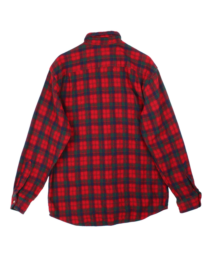 Pendleton Flannel Shirt in a red and black colourway with all over plaid pattern. button up with classic pocket on the front.