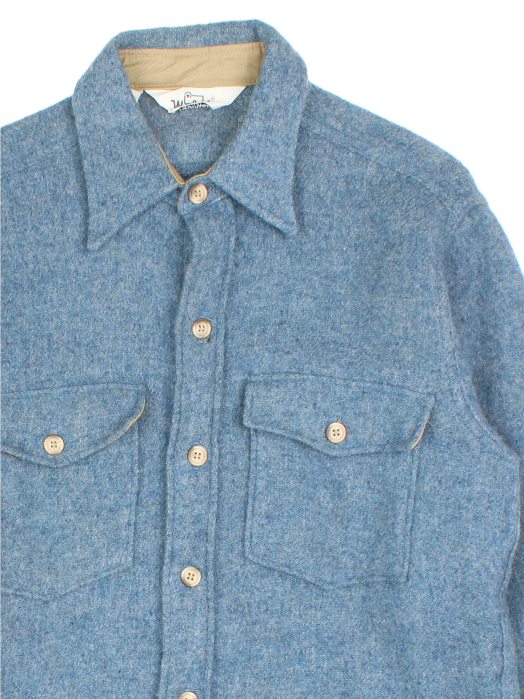 Woolrich Shirt in a blue colourway. Full button up with two pockets on the front.
