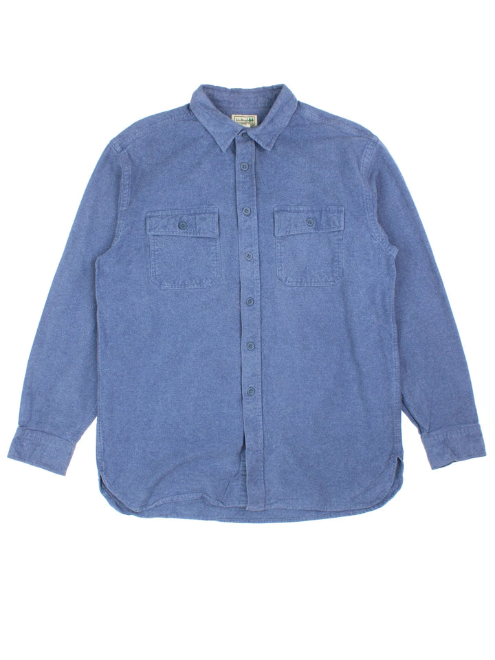 Vintage L.L Bean Shirt in a blue colourway. Button up with two pockets on the front.