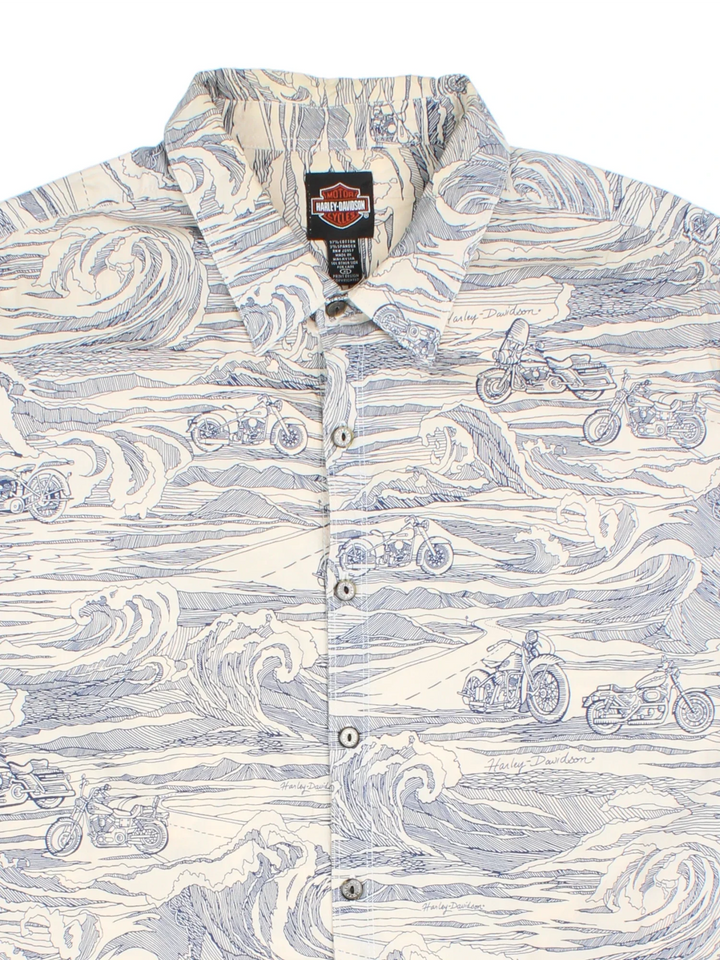 Harley-Davidson Shirt in a white and blue colourway, button up with front pocket and all over motorcycle and wave print. Harley-Davidson detailing on the buttons.
