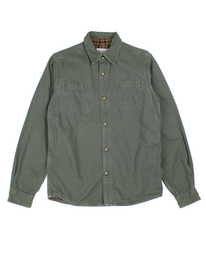 Carhartt Shirt in a green colourway, button up and has double chest pockets.