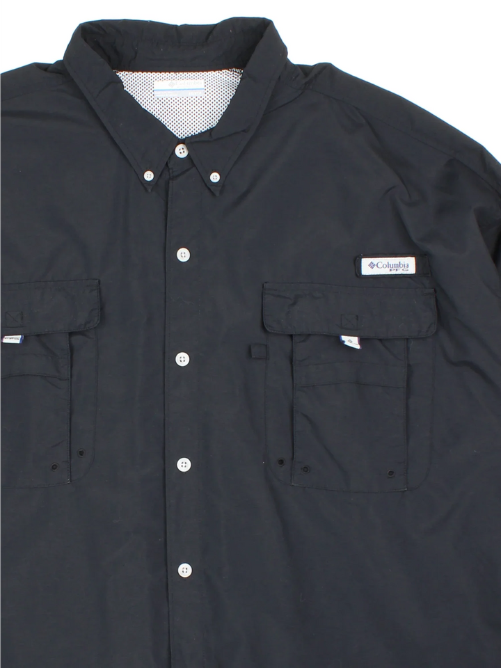 Columbia PFG Shirt in a black colourway, button up and has multiple pockets with the logo embroidered on the front.