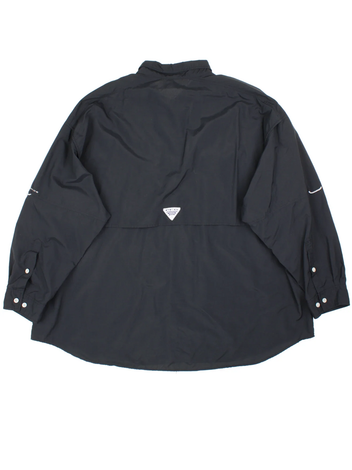 Columbia PFG Shirt in a black colourway, button up and has multiple pockets with the logo embroidered on the front.