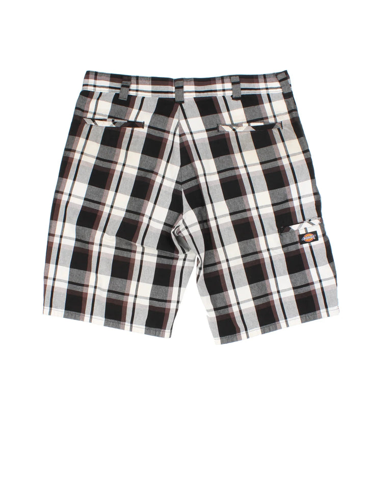 Dickies Checkered Shorts in a black, brown and white colourway with multiple pockets, and the logo embroidered on the back.