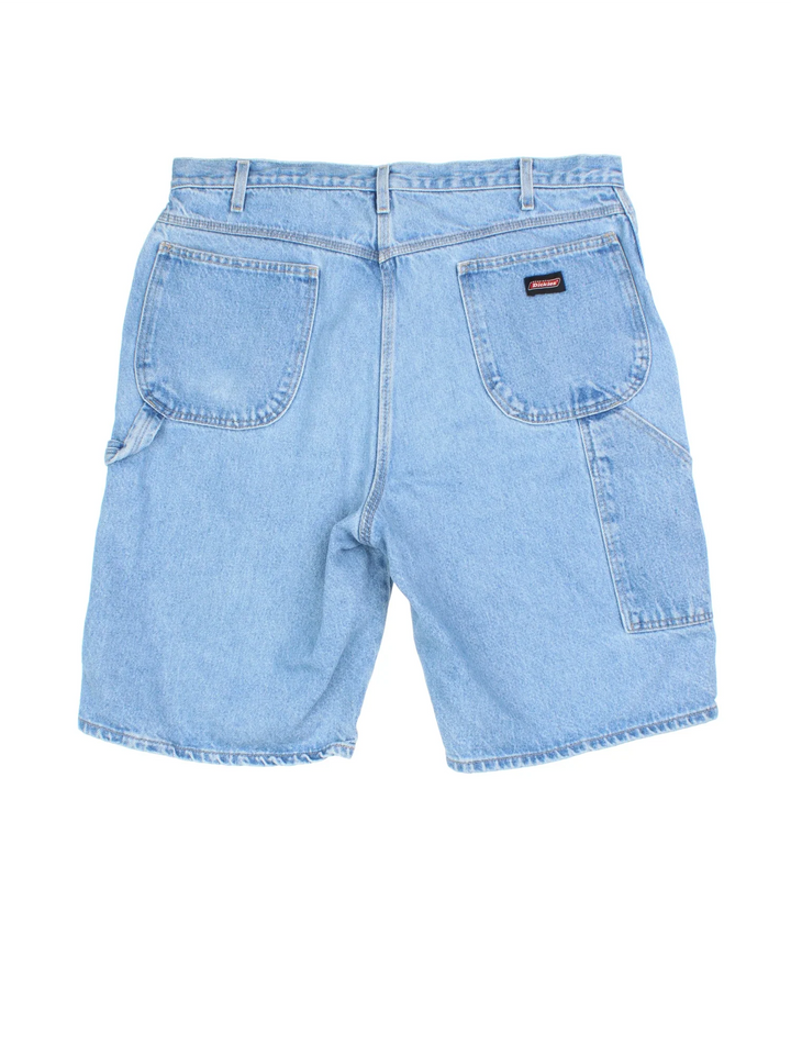 Dickies Jorts in a blue denim colourway with multiple pockets, and the logo embroidered on the back.