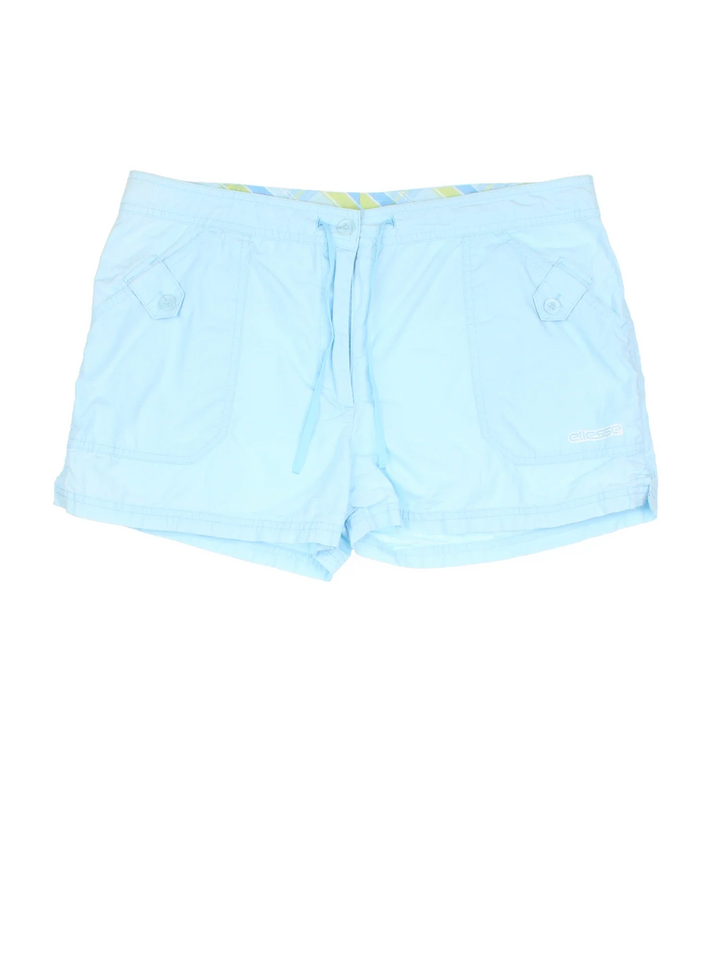Vintage Y2K Ellesse shorts in blue colourway with multiple pockets, drawstring waist and the logo printed on the front and back.