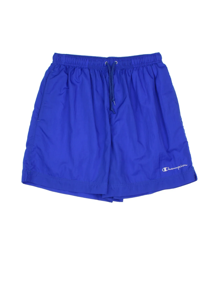 Vintage Champion Sports Shorts in blue colourway with pockets, elasticated/drawstring waist and the logo embroidered on the front.