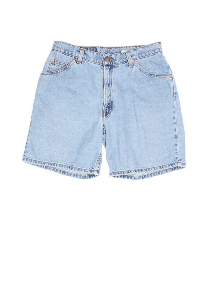 Vintage Levi Strauss Denim Shorts in blue colourway. Zip button fastening, multiple pockets and leather patch/tab branding on back.