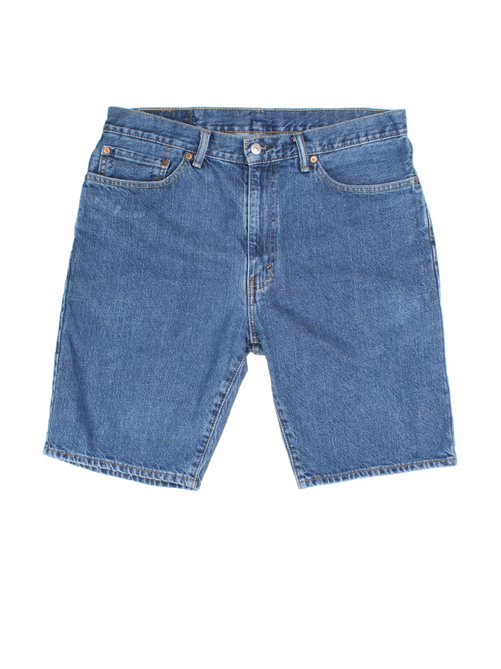 Vintage Levi Strauss Denim Shorts in blue colourway. Zip button fastening, multiple pockets and leather patch/tab branding on back.