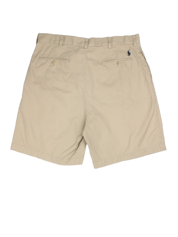 Vintage Ralph Lauren Shorts in tan colourway. Zip button fastening, multiple pockets and embroidered branding on back.