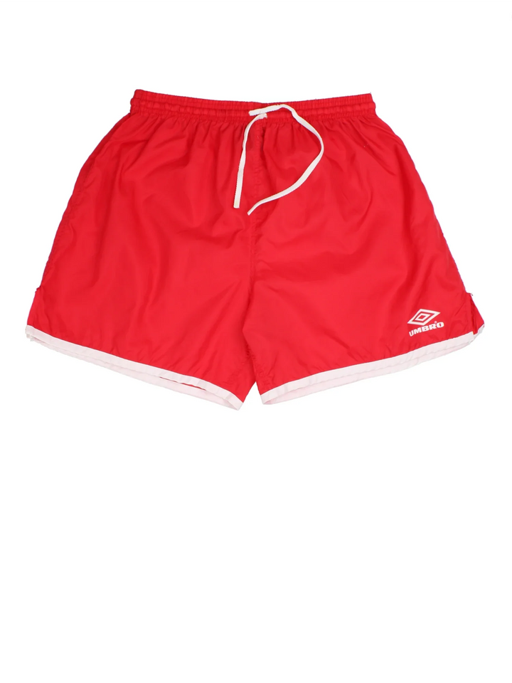 Vintage 80's Umbro Sports Shorts in red colourway with white trim. Drawstring waist and the logo printed on the front.