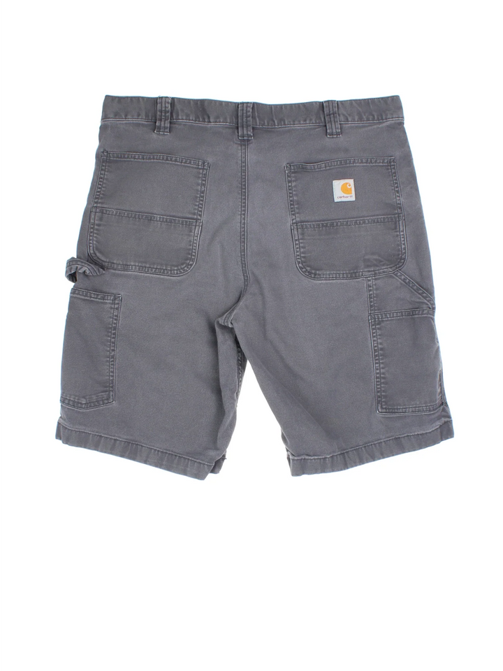 Vintage Carhartt Shorts in grey colourway with multiple pockets and embroidered branding on the back.