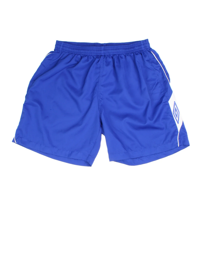 Vintage Umbro Sports Shorts in blue colourway with white trim. Drawstring waist and logo printed down side seams.