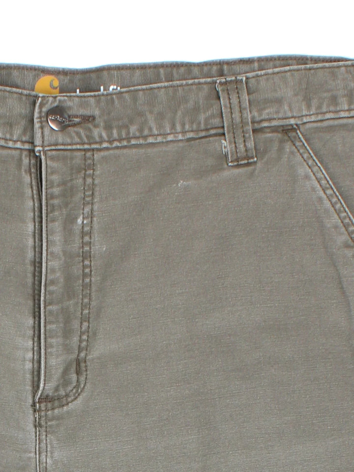 Vintage Carhartt Shorts in green colourway with multiple pockets and embroidered branding on the back.