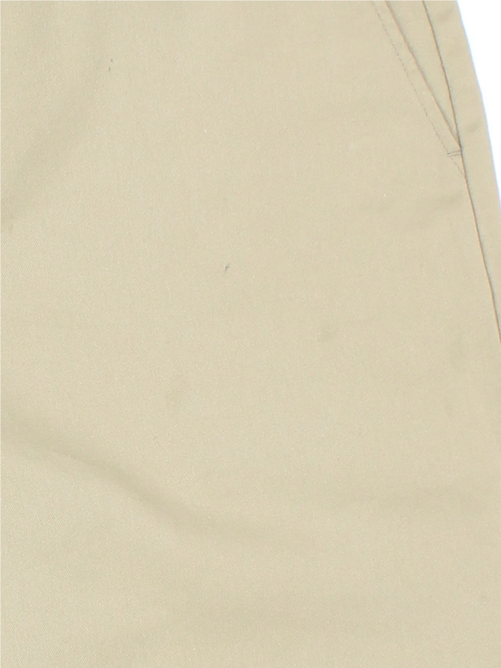 Vintage Dickies shorts in tan colourway with multiple pockets and the logo embroidered on the front/side pocket.