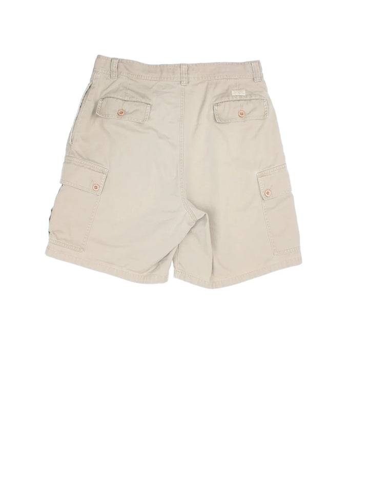 Ralph Lauren Pleated Cargo Shorts in tan colourway, multiple pockets and logo embroidered on back.