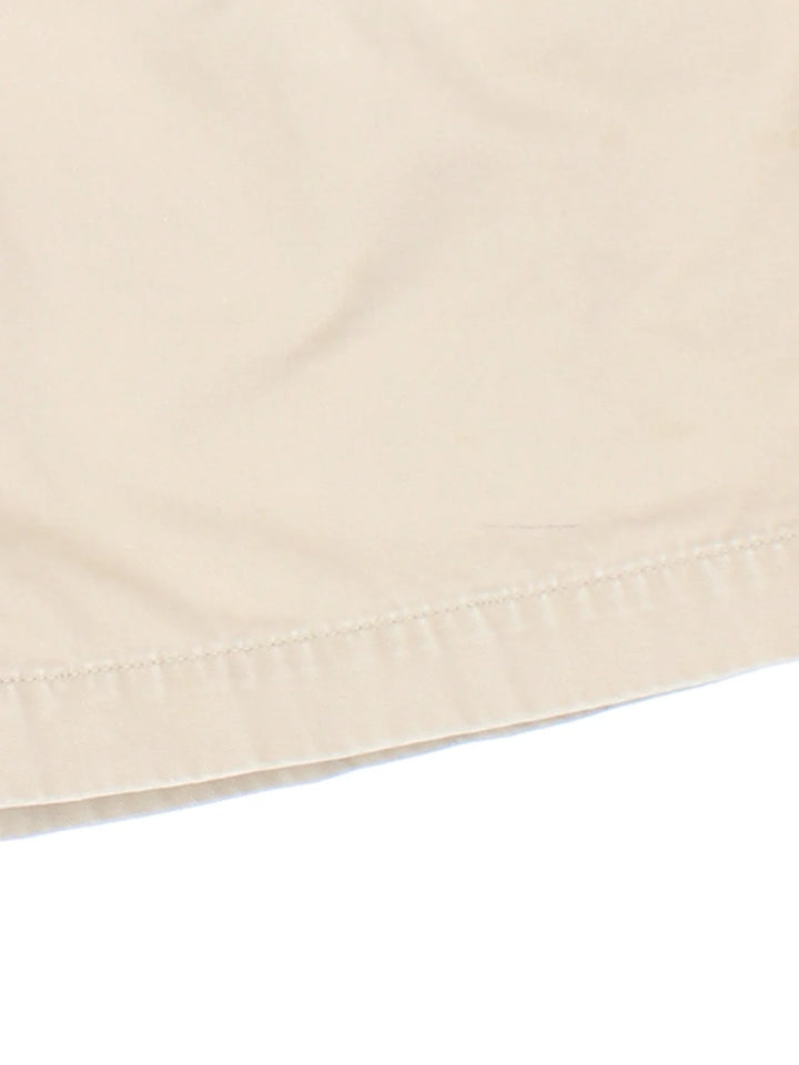 Vintage Ralph Lauren Pleated Shorts in tan colourway, front pleats and logo embroidered on back.