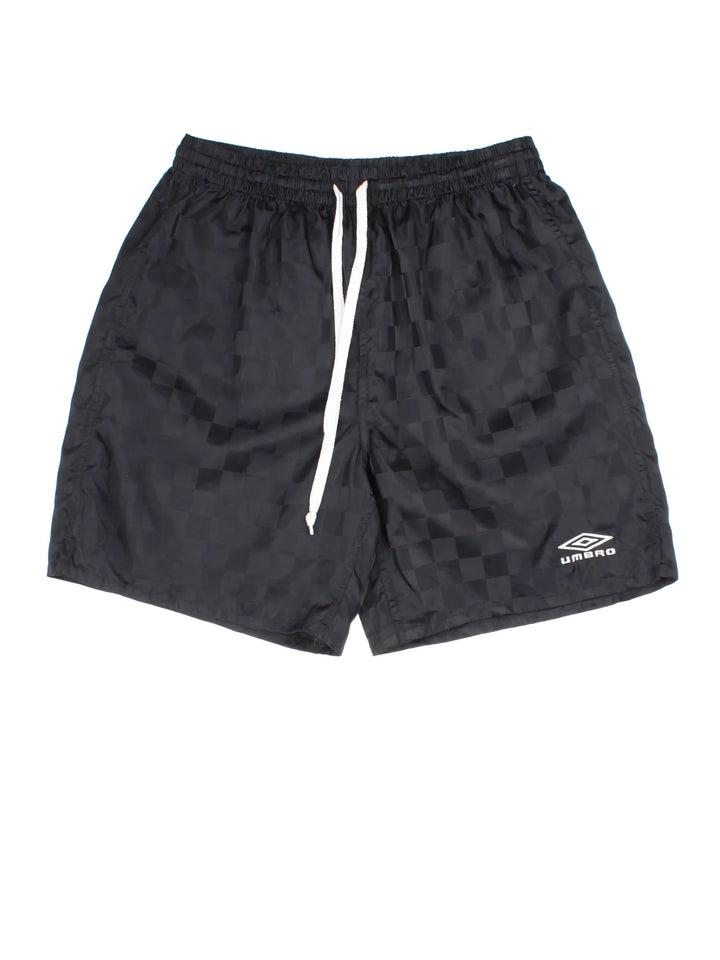Vintage Umbro Sports Shorts in a black checked colourway, with drawstring waist and logo printed on the front.