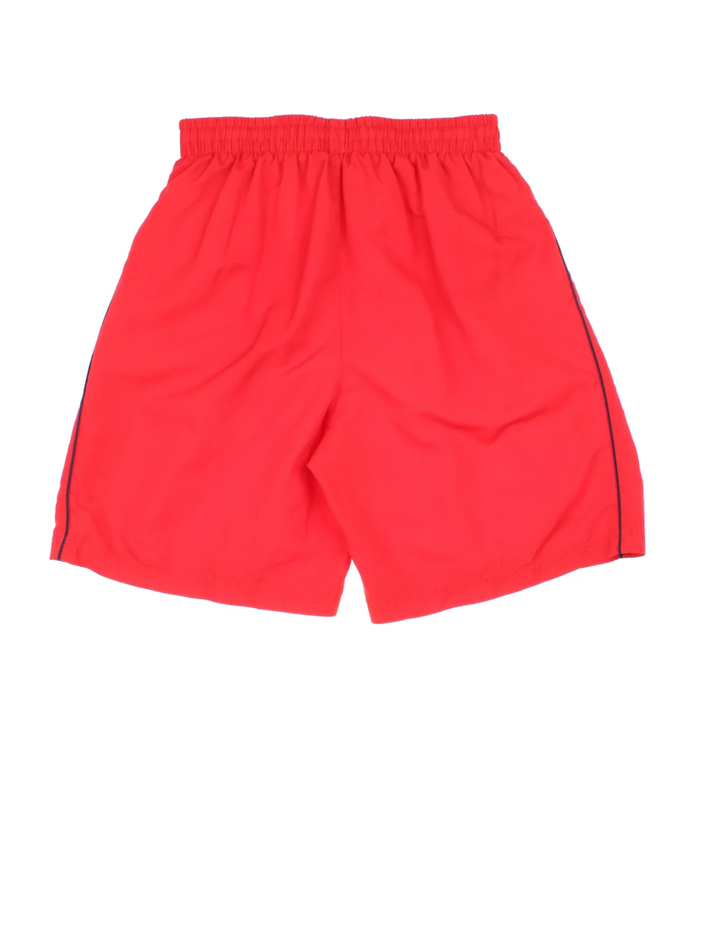 Vintage Umbro Shorts in red colourway with mesh lining, contrast black piping and the logo embroidered on the front and leg.