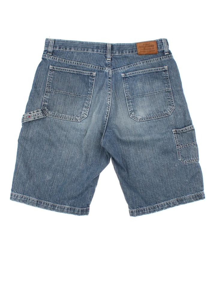 Vintage Tommy Hilfiger Jorts in blue colourway with multiple pockets and leather logo on the back.