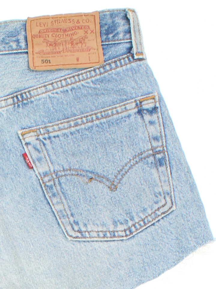 Vintage Levi Strauss Cut Off Denim Shorts in blue colourway with multiple pockets and the logo embroidered on the back.