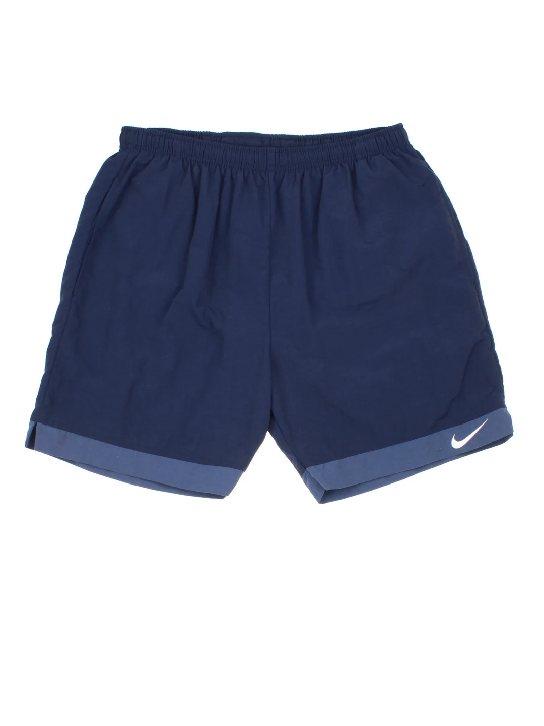 Vintage 90's Nike Sports Shorts in blue colourway with embroidered logo on the front.