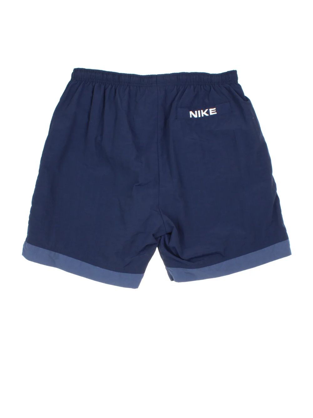 Vintage 90's Nike Sports Shorts in blue colourway with embroidered logo on the front.