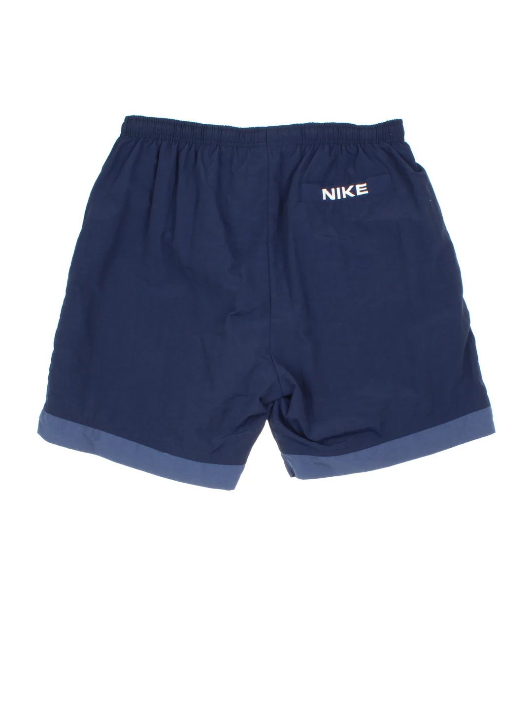 Vintage 90's Nike Sports Shorts in blue colourway with embroidered logo on the front.