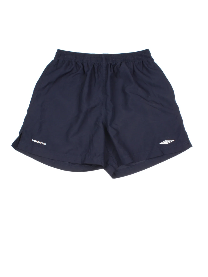 Vintage Umbro Shorts in blue colourway with drawstring waist, side pockets and logo embroidered on front.